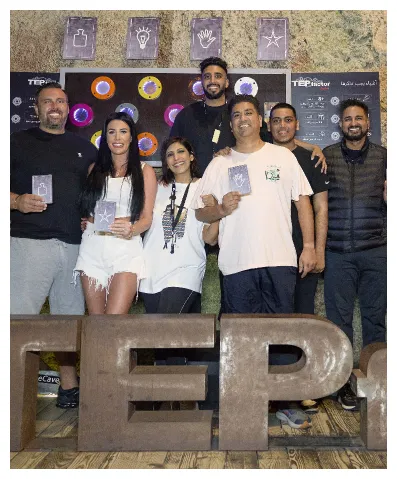 Colleagues completing indoor adventure challenges together at TEPFactor